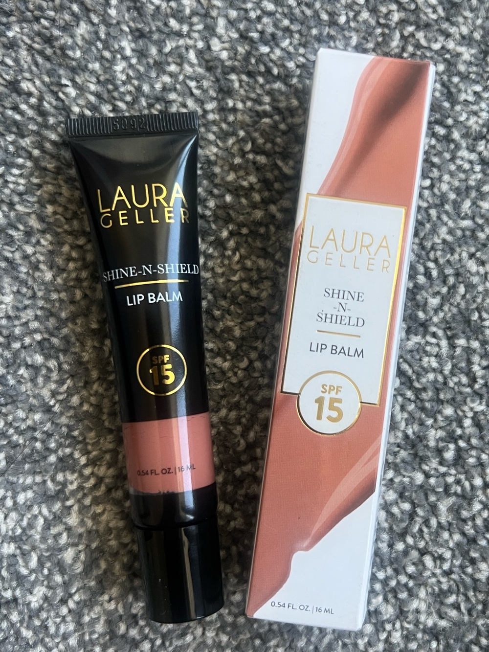 Laura Geller Shine-N-Shield Lip Balm — Golden Hour